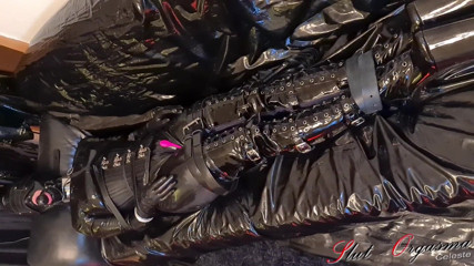 Slut Orgasma Celeste: Slave slut-orgasma Celeste bound in black latex and leather pushed...