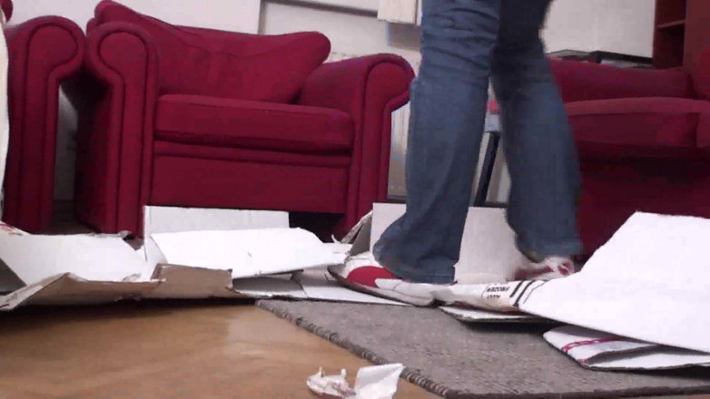 Foot Girls: Trampling boxes in the living room