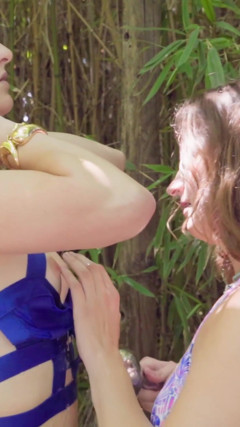 Two Shemales Shower and Suck Each Other's Dick in Nature Between the Bamboos thumbnail