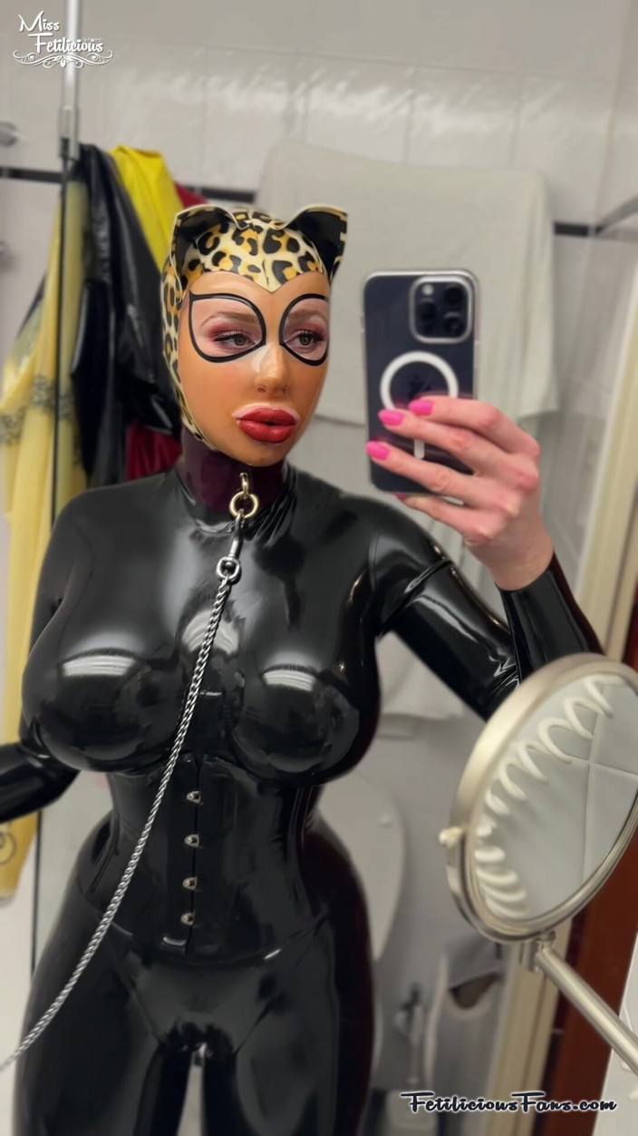 Miss_Fetilicious: Latex Leopard on a Leash