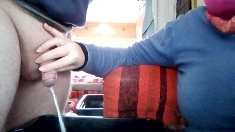 Sex hub couple: Jen is holding John's cock when he is peeing into...