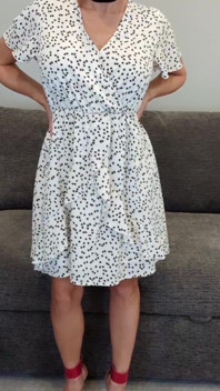 Sadie in a White Dress with Hearts and Red Heels