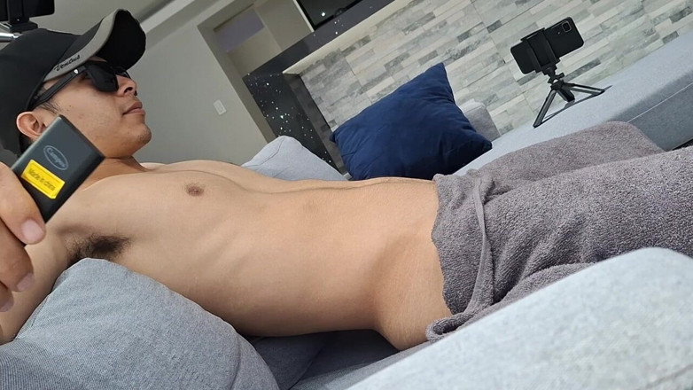 Bare skin man: Relaxing on the Sofa