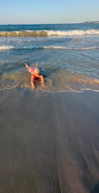 Try Not to Wet My Hair While Play with the Waves