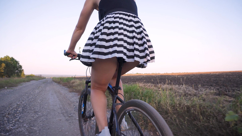 Teasecombo 4K: Flashing Ass While Riding a Bicycle Under Skirt