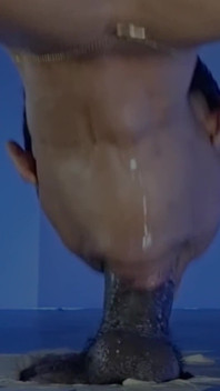 Sucking a Huge Black Cock in a Glory Hole