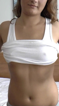 A Perky Teen Girl Introduces Herself and Shows off Her Long Labia.