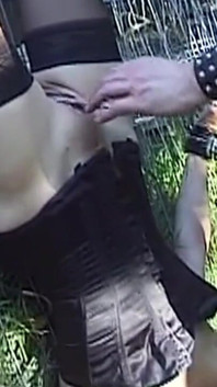 Corseted Brunette MILF Enjoys Masked Oral Devotion Outdoors