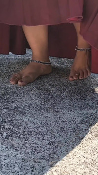 Indian Girl in Red Skirt and White Top