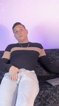 Latino Shows off His Bump on Camera Inside His Gray Sweatshirt