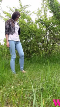 Desperate Skinny Girl in Jeans Trying to Hold Her Pee in the Forest