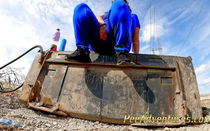 Pee Adventures: She doesn't have where to pee but on this excavator...
