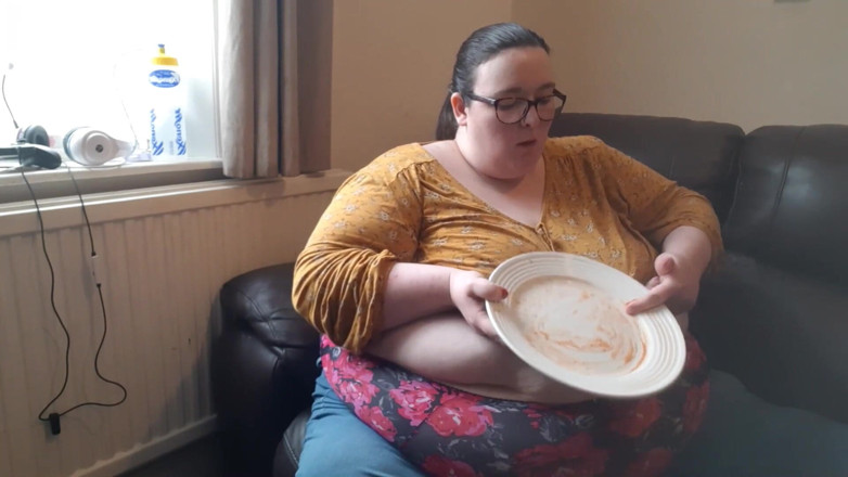 SSBBWLadyBrads: SSBBW huge belly whilst eating on sofa
