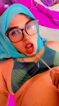 Beautiful Hijabi Transgender Peeing in Mouth