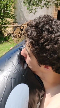 Beautiful Man Inflates His Inflatable Whale Near Pool Outside