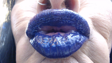 Abby Anna: Blue purple lip wand closeup duck