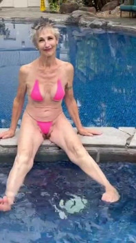 By the Hotel Pool in My Skimpy Pink Bikini