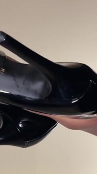 Dangling Black Heels Tease