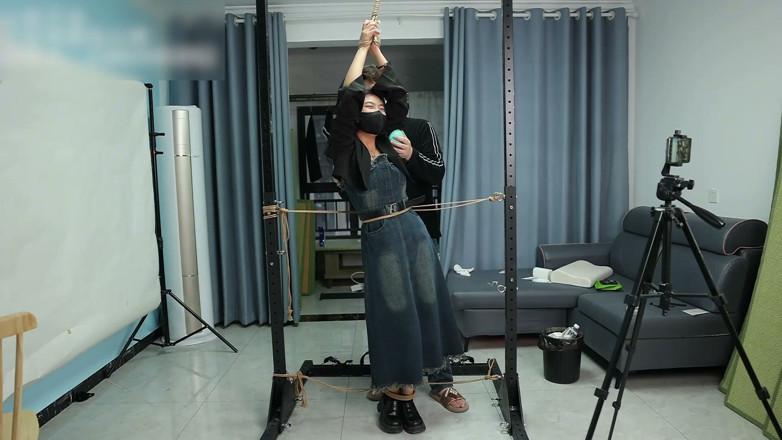 Asian bondage: My Girlfriend Is Fixed to a Metal Stand, Tickling Her