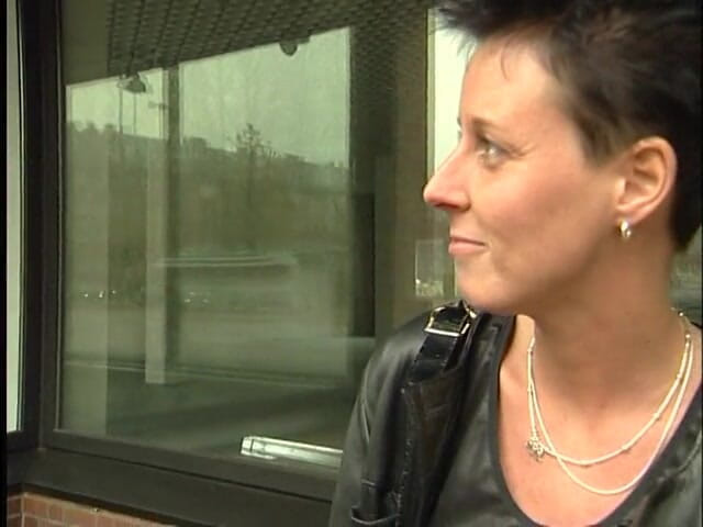 Lucky Cooch: A short-haired German girl was interviewed outdoor.