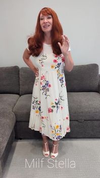 A Redhead in a Dress