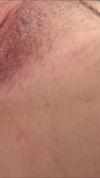 Sexy brunette masturbating with her dildo toy in close up