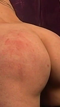 Tattooed Blonde MILF Endures Dungeon Spanking Session
