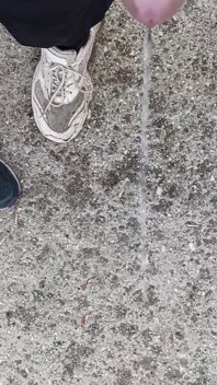 Friend Is Holding My Cock While Im Peeing on the Ground Outdoor