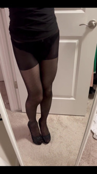 Looking Self in the Mirror in the Poka Dots Black Pantyhose.