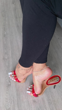 Red Heels and White Nails
