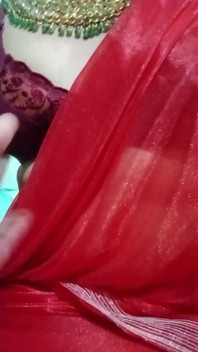 Indian Gay Crossdresser Bottom Gaurisissy Pressing Her Big Boobs and Feeling Horny in Red Saree with Heavy Jwellery