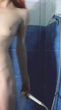 Skinny Anorexic Redhead Taking a Shower and Playing with Her Small Tits and Cunt