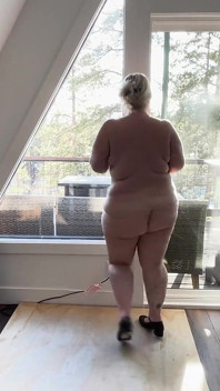 Stripping Whore Shows off Her Curves in Front of the Window Shaking Her as and Jiggling Her Boy She Instructs You to Cum