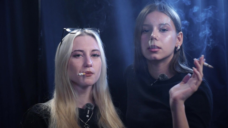 Russian Smokers: Two Women Smoking Together in a Dark Studio with Soft...