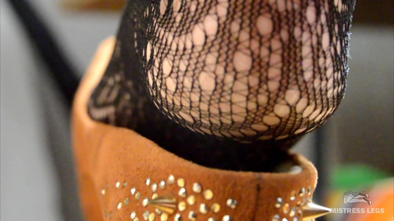 Mistress Legs: My lazy dangling shoe on the feet in black fishnets