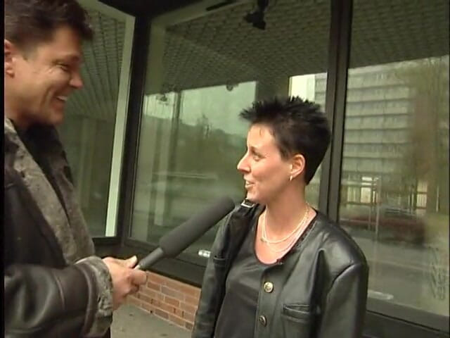 Lucky Cooch: A short-haired German girl was interviewed outdoor.