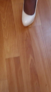 Walking in My High White Shiny Stilettos