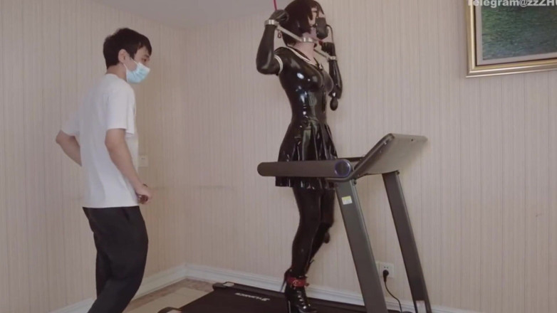 Aisan girl bondage: Mz24 - a Girl Bound to a Treadmill with Metal Restraints...