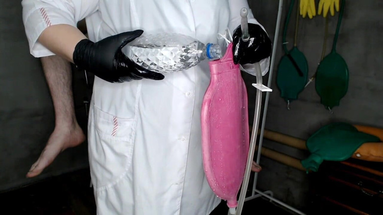 OurFetishLife: Chubby Beautiful Nurse Gives a 1.5 Liter Enema Bag to the...