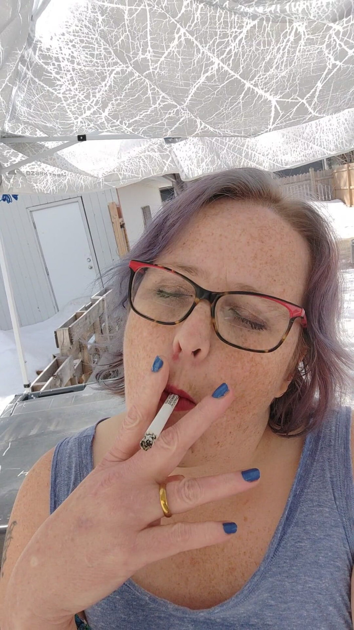 AngYourDirtyCanadian: Calm Outdoor Smoking Moment with a Playful Lipstick Look