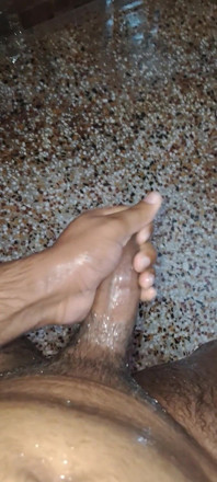 A Young Hindu Boy From India Is Fucking His Thick Cock Hard with His Hands While Taking a Bath