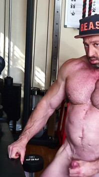 Madison Pumps Biceps and Jerks Out a Load on the Weight Bench