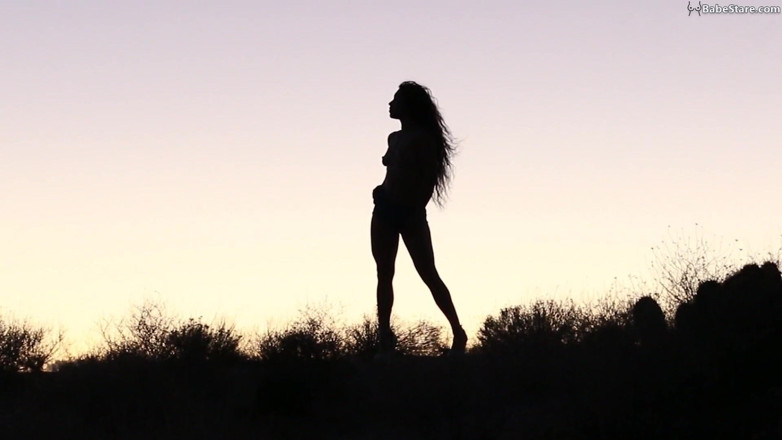 Babe Stare: Sexy Tia girl is nude but only teases in silhouette