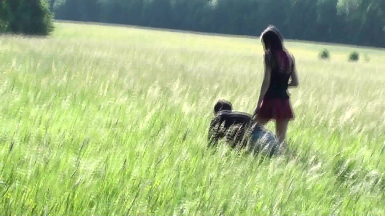 Femdom Austria: Pet on the leash in a meadow