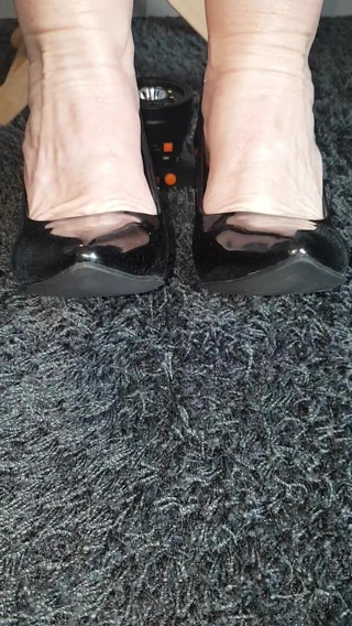MisS Angel: Shiny black heels.