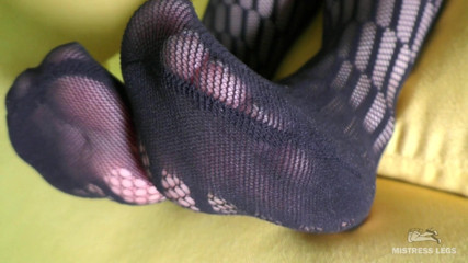 Mistress Legs: Toes wiggling in black mesh bodysuit
