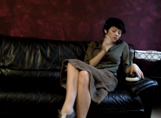 Femdom Austria: Black haired teen smoking a cigarette