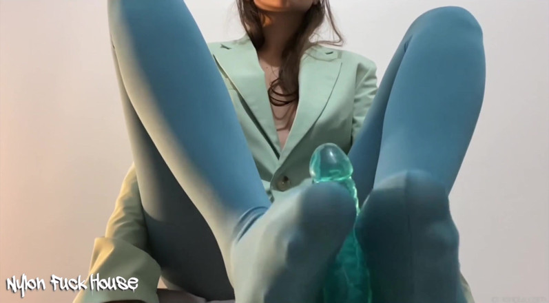 Anstralia: The secretary jerks off the dildo with her feet in...
