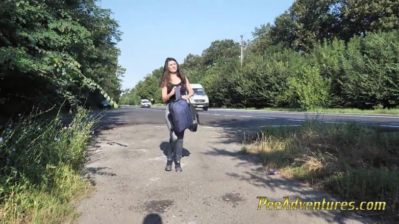 Pee Adventures: Skinny brunette hitchhiking with her bladder full