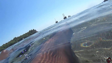 Nylondelux: Black Stocking and Anal Beads in the Sea